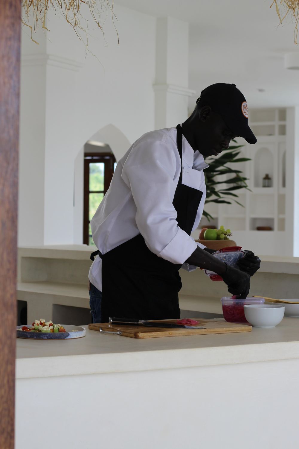 Chef preparing a dish in the kitchen