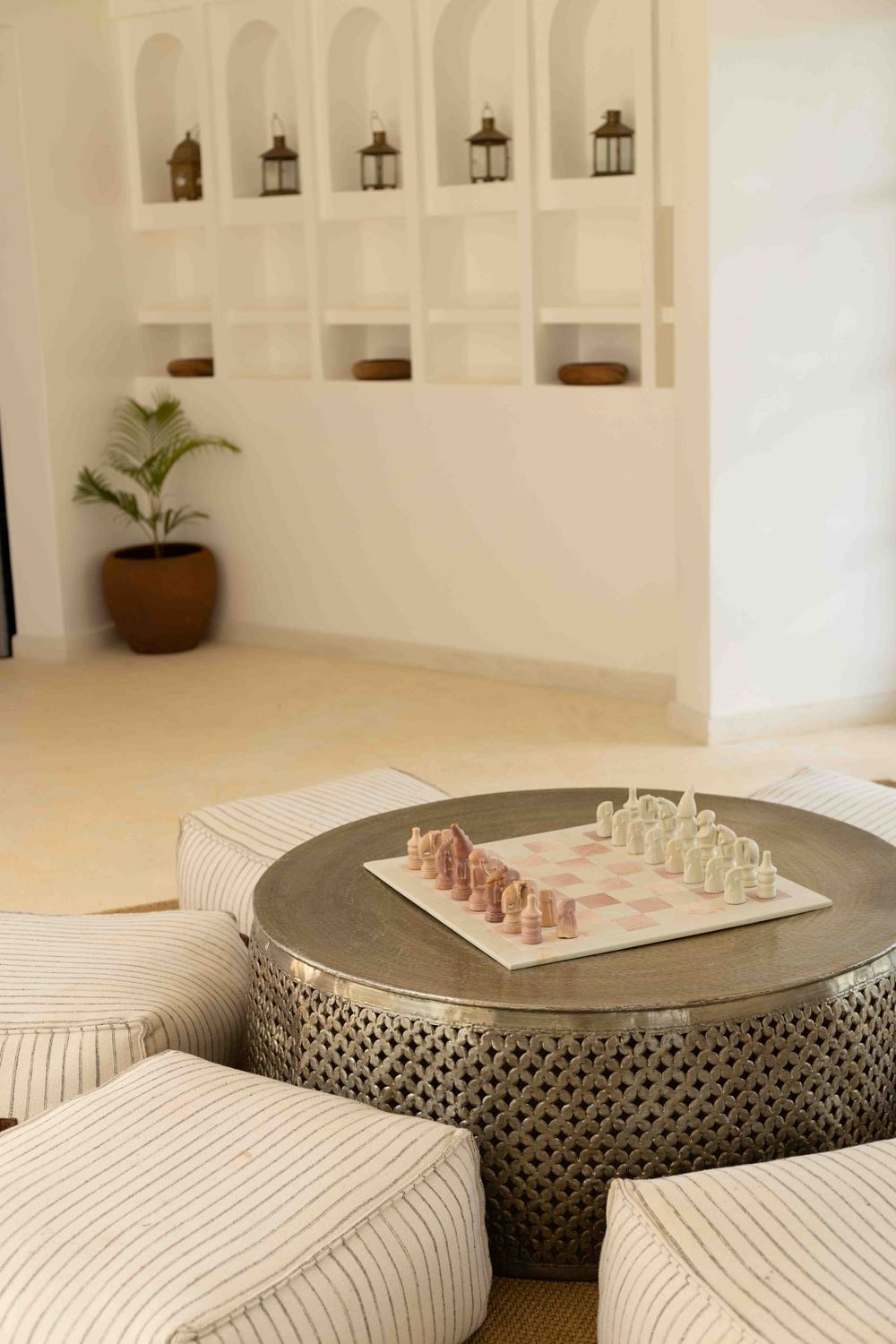 Chess set on a hammered metal table