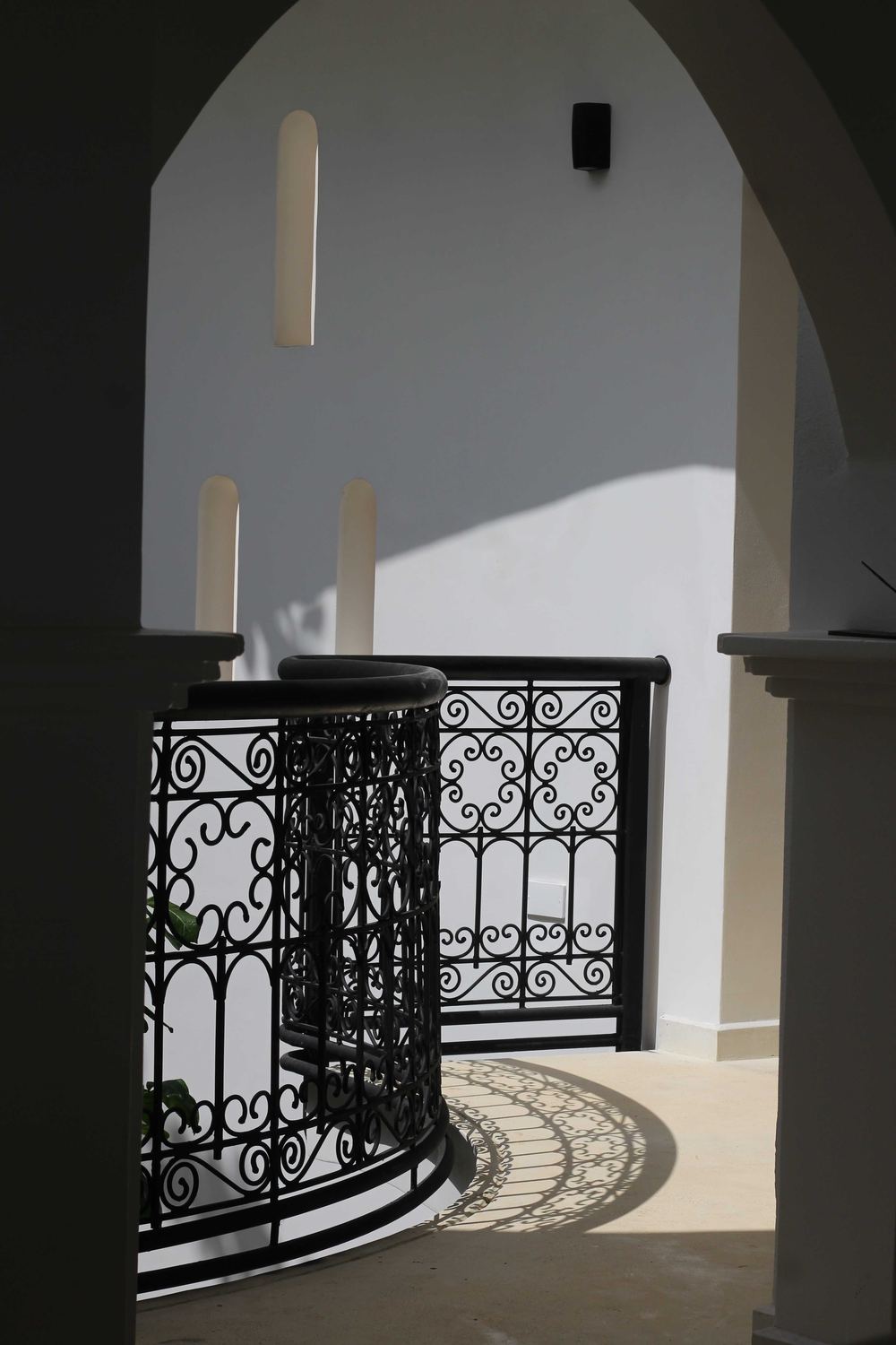 Detail of the hand-forged spiral staircase railing